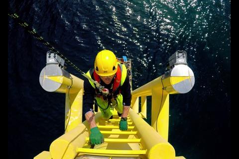 A technician accesses an offshore turbine during the O&M phase